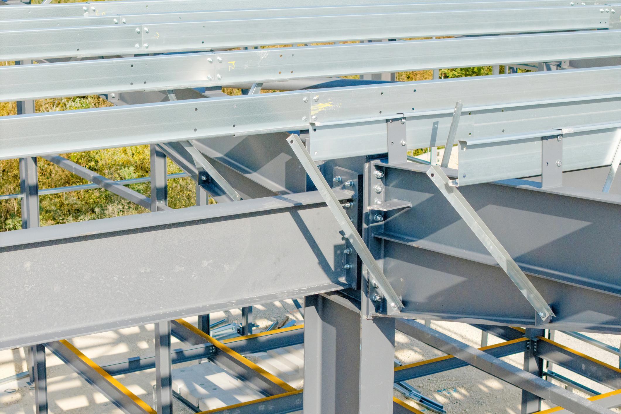 Steel building frame erection by Dykman Construction and American Buildings