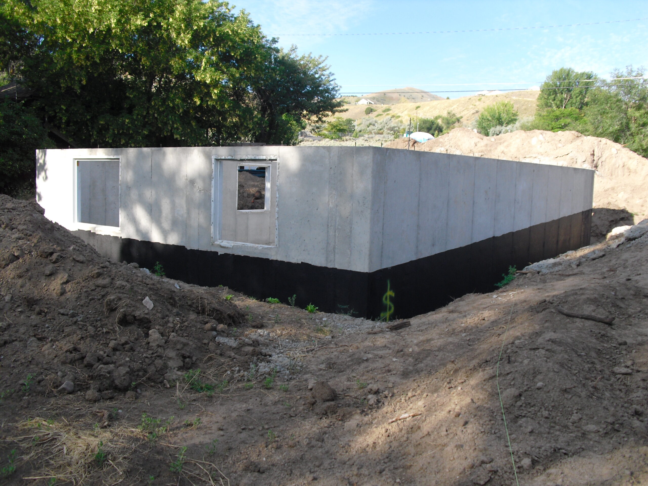 Commercial concrete structure with walls completed during active construction