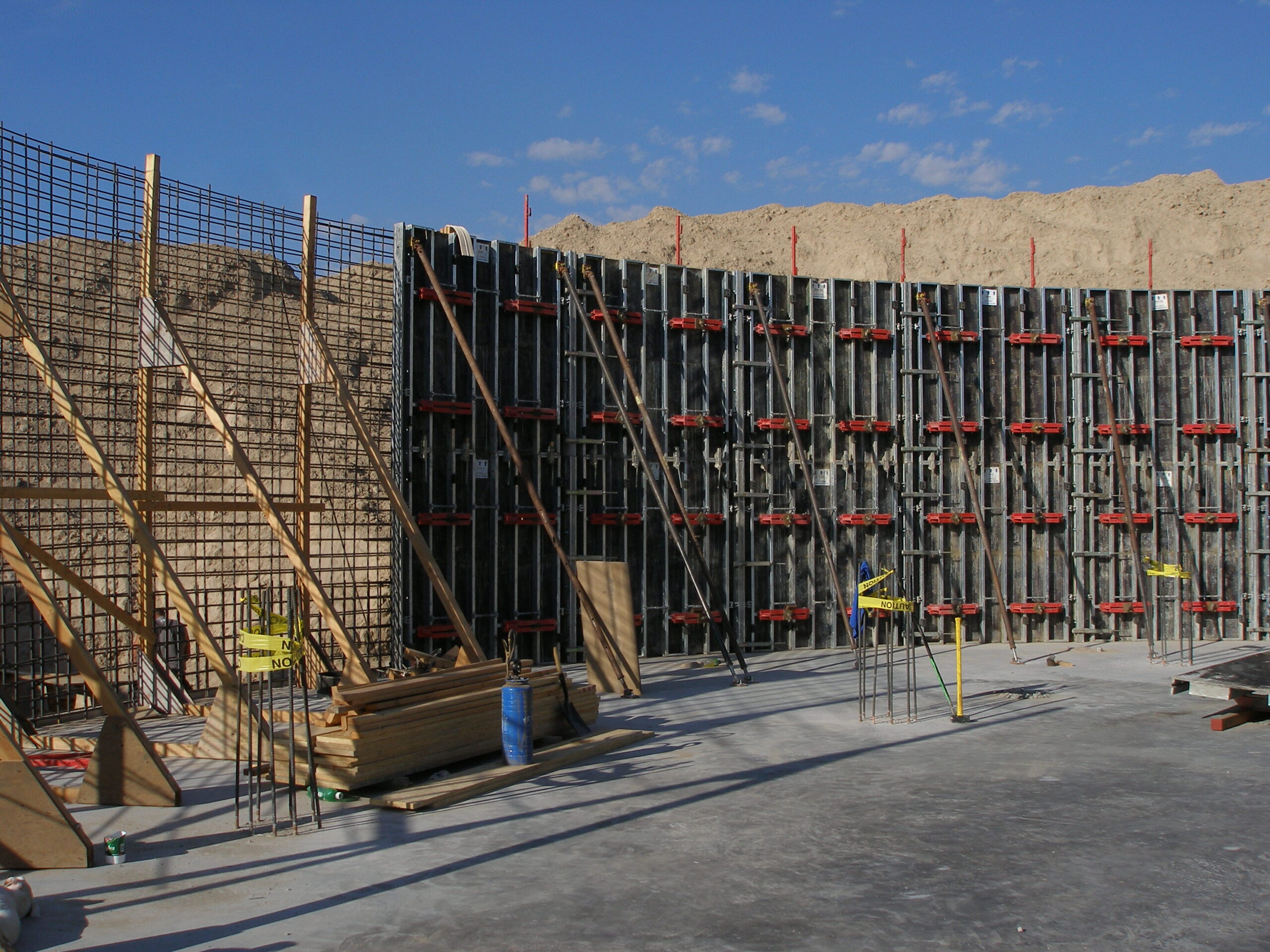 Commercial concrete wall installation during structural construction project